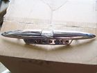 1599496 Belvedere Plymouth Emblem Savoy Hood 1955