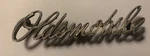 Oem 68 69 70 Oldsmobile Grill Hood Script Nameplate 399094. Fixed Price $16.90.