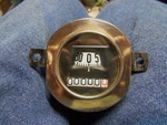 Model Ford, Stewart Warner, Round Speedometer New Numbers. Fixed Price $200.00.