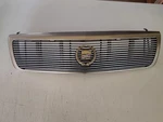 1995-2002 95-02 Cadillac El Dorado Gold Grille W/horizontal Billet Insert. Fixed Price $325.00.