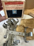 One Nos Windshield Washer Bottle Bracket Gm# 1050333, With Screws. Fixed Price $45.00.