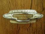 1946 1949 Oldsmobile Hydra-matic Drive Trunk Ornament Bel-park Motors Tag Script. Fixed Price $95.00.