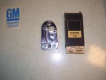 Gm Lh Door Lock Striker Nos 4664964. Fixed Price $45.00.