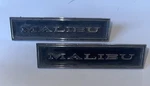 Pair Of 7793368 Gm Chevy Malibu Panel Emblems 1970. Fixed Price $19.88.