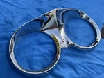 1960 Cadillac Headlight Bezel Looks Nos. Fixed Price $145.00.
