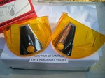 New Pair Of Amber Vintage Style Head Light Visors !. Fixed Price $15.99.