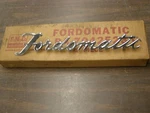 Nos Oem 1952 Fordomatic Deck Lid Emblem Script Ornament Stainless Steel. Fixed Price $109.00.