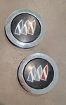 Set Of 2 Used Buick Wheel Center Hubcaps 7087 Chrome & Color Logo Emblem. Fixed Price $17.00.