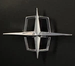 1958-1960 Lincoln Chrome Star Emblem Mounts To "c" Roof Pillar New. Fixed Price $119.00.
