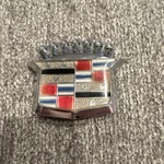 Vintage Cadillac Trunk Lock Emblem. Fixed Price $30.00.