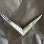 1950-51 Cadillac Trunk Emblem Trim Univex 1456038 V-shaped Chrome. Fixed Price $65.00.
