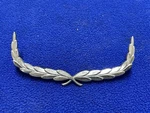 Ford Genuine Nos Wreath Ornament Emblem D1AZ-65517A58-A (QTY-1). Fixed Price $30.00.