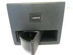 85-88 Thunderbird Cougar Rear Panel Whit Ashtray And Light Switch New Nos. Fixed Price $27.99.