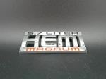 Dodge Ram Hemi Magnum 5.7 Liter Oem Emblem Badge 55077830AA Genuine Mopar Part. Fixed Price $18.99.