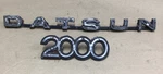 Datsun Roadster 2000 Emblems. Fixed Price $59.12.