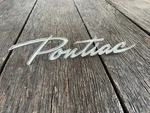 1961 Pontiac Tempest Grille Emblem Script Oem Nice #540455. Fixed Price $47.50.