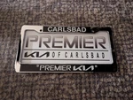 New Carlsbad California Premier Kia Dealer Plastic Chrome License Plate Frame. Fixed Price $39.99.