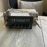 Vintage Ford Am Radio 6A-D7TF-18806 Untested Core Dash Filler. Fixed Price $30.00.