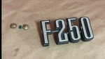 Nos Ford D4TZ16720B 1973-76 F250 Front Fender Emblem Lh Rh. Fixed Price $67.50.