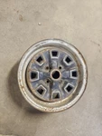 Mg Midget 1970-71 Used Early Rostyle Road Wheel. Fixed Price $60.00.