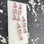 1970-74 Chevelle. Camino; "454" Front Fender Emblem; Each. Fixed Price $25.00.