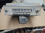 1957 Ford Am Car Radio W/ Bezel FEG-18842-C Fomoco. Fixed Price $75.00.