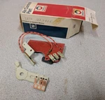 Delco Gm Arm & Board # 1223405, 15-7626 Nos In Box Part. Fixed Price $14.99.